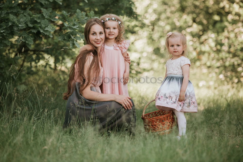 Similar – happy family: young mother walks with her child in the Park