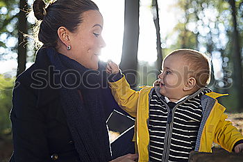 Similar – Grandma has her grandson on her arm