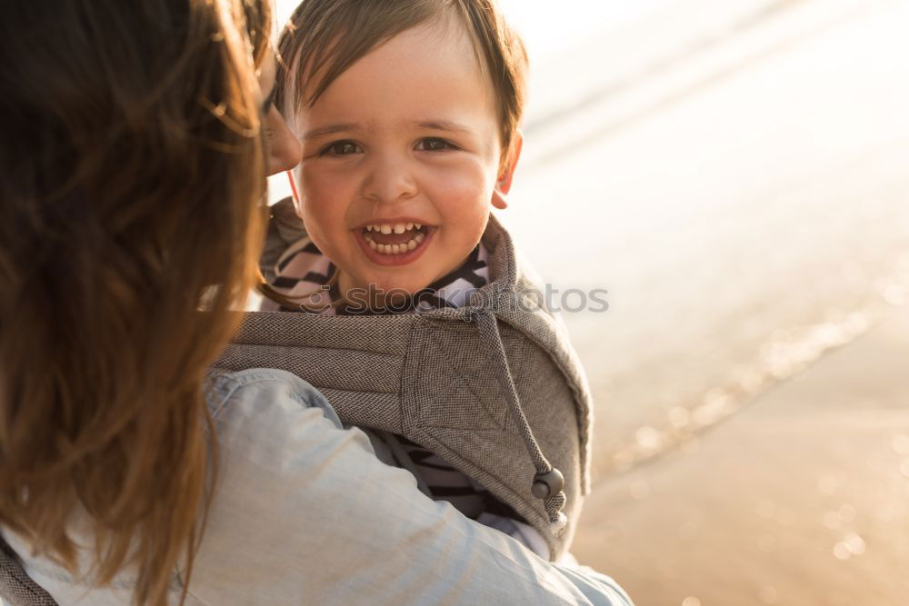 Similar – mother kissing little baby at bar terrace