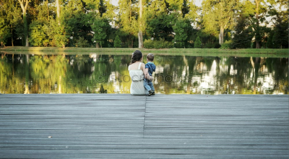 Similar – Image, Stock Photo Woman relaxing on a bridge in nature