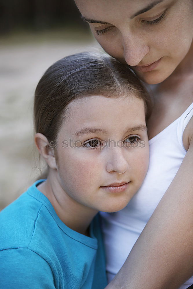 Similar – Image, Stock Photo sad daughter hugging his mother at home. Concept of couple family is in sorrow.