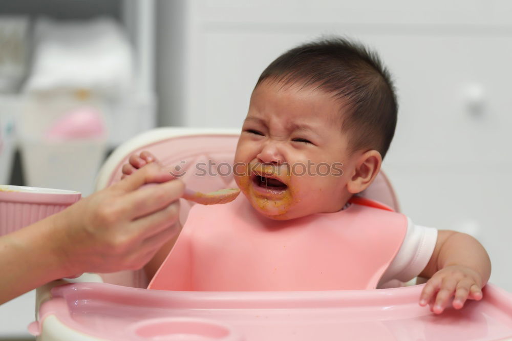 Similar – Image, Stock Photo baby sitting sad and crying in the room