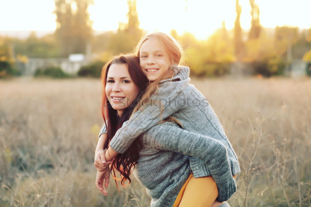 Similar – happy mother and daughter on the walk on summer