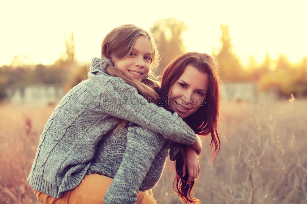 Similar – happy mother and daughter on the walk on summer