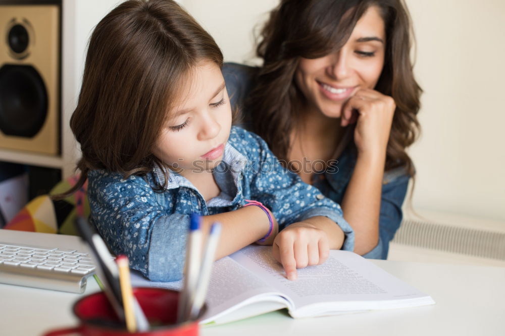 Similar – Image, Stock Photo Teenagers sitting by a blackboard at school