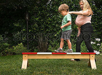 Similar – bouncing kid on trampoline