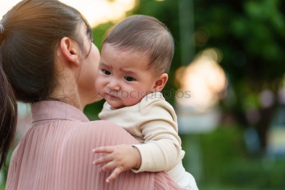 Similar – Image, Stock Photo mother holding happy baby in the garden