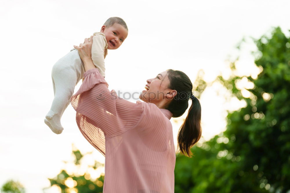 Similar – Image, Stock Photo Mother with child in park