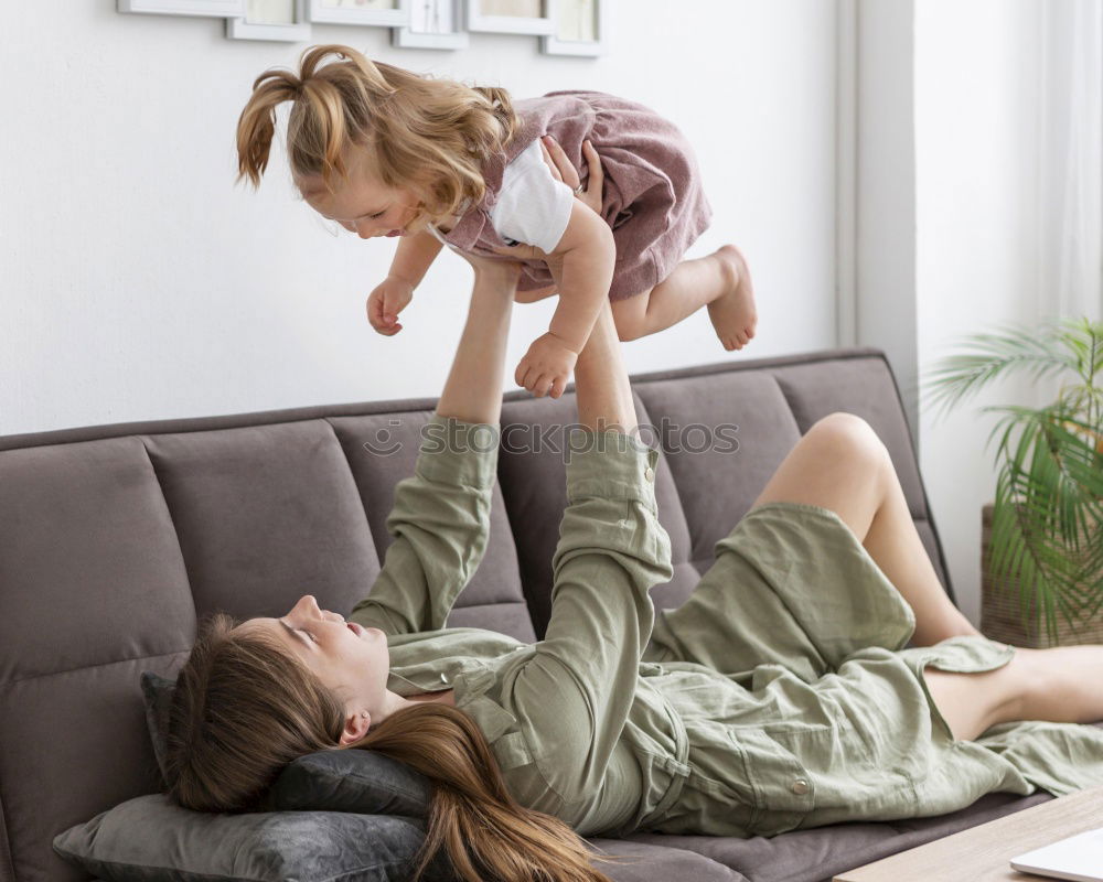 Similar – Image, Stock Photo Happy Mother tickling her cute toddler son at home