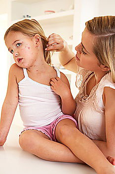 Similar – mother brushing toddler daughter’s hair