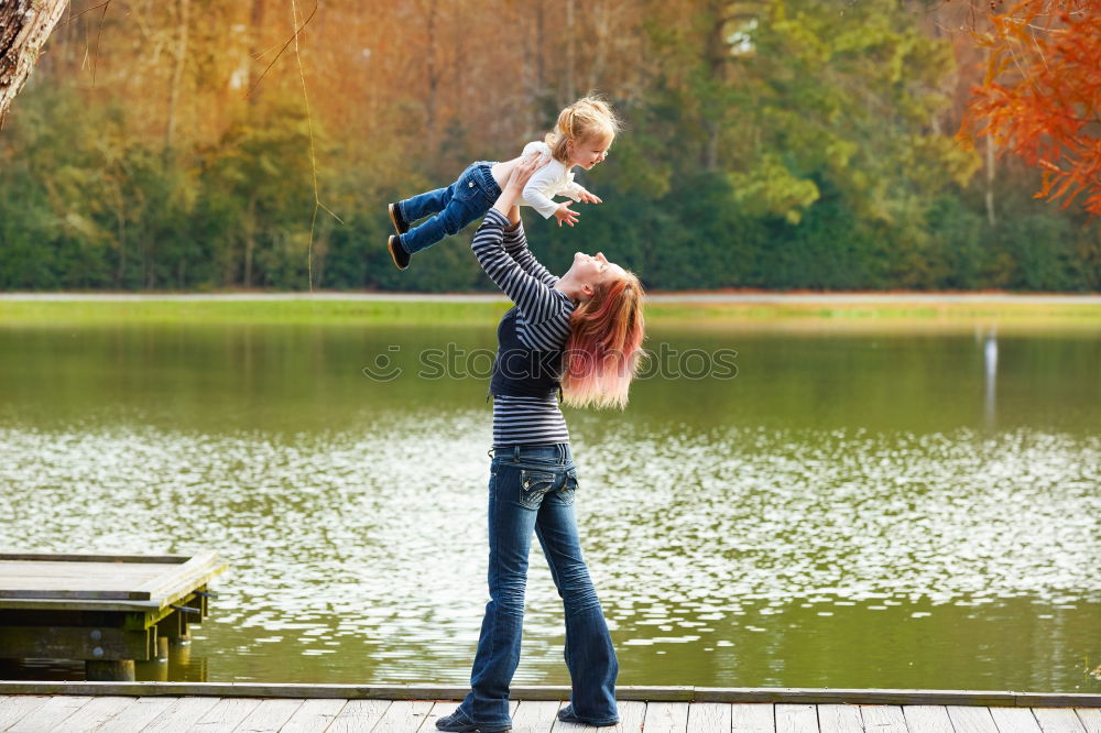 Similar – Mother playing with child in park