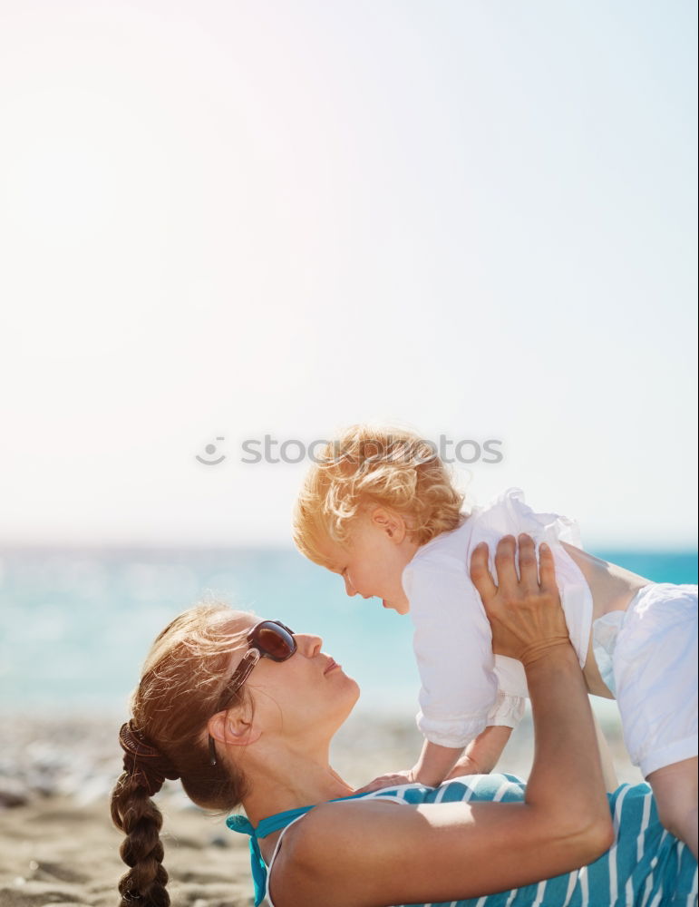 Similar – mother looking with admiration at baby child