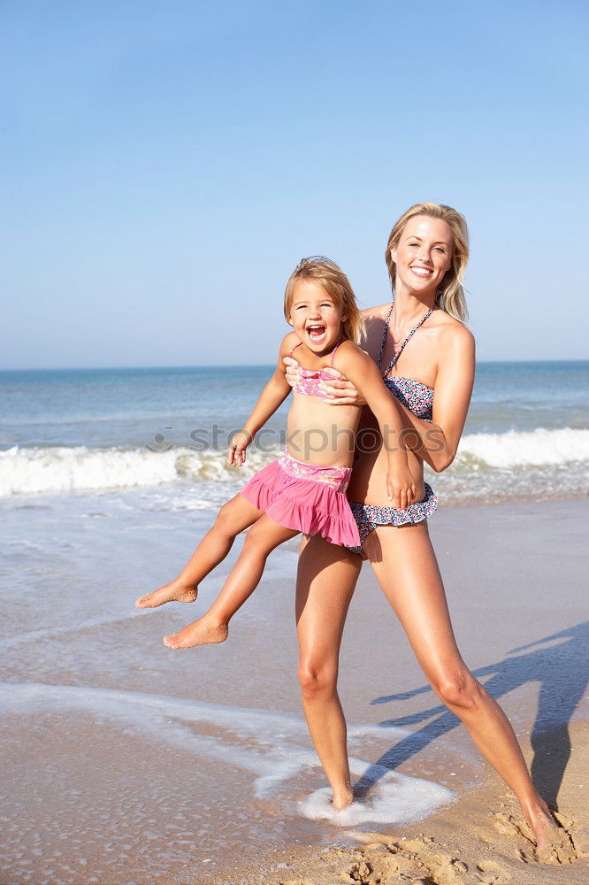 Similar – Two sisters and brother playing on the beach at the day time. Concept Brother And Sister Together Forever