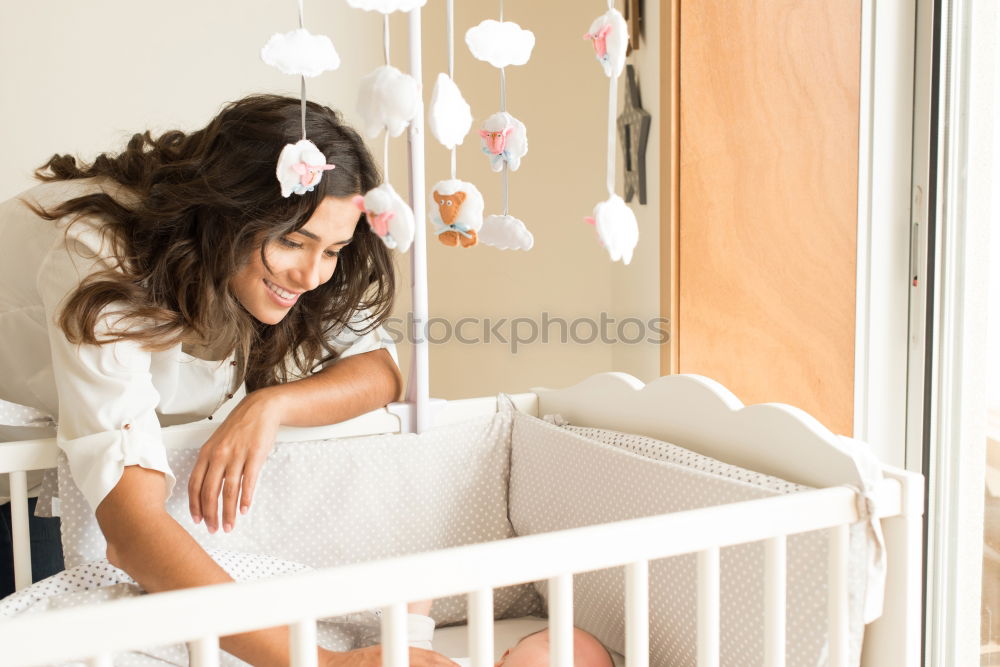 Similar – Image, Stock Photo Mother and toddler son wrapping christmas gifts together