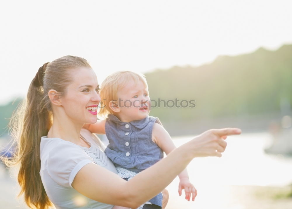 Similar – Image, Stock Photo Mother with child in park