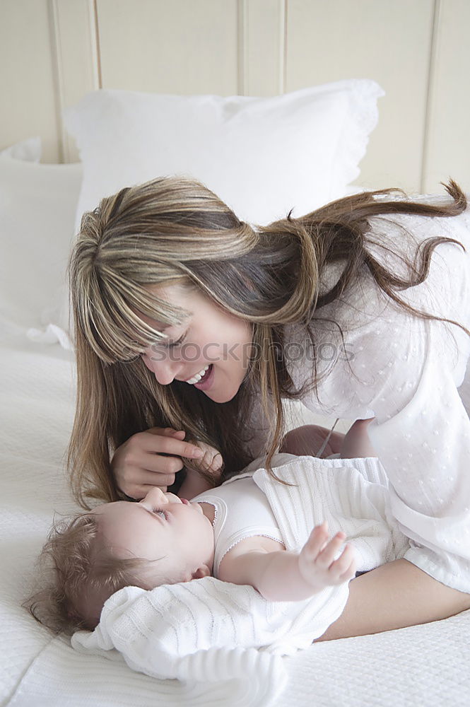 Similar – cute happy child girl relaxing at home on the bed