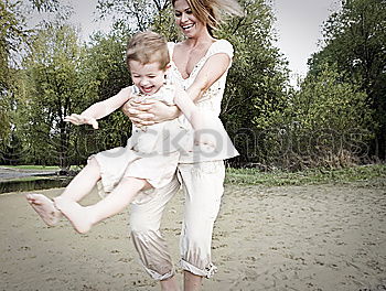 Similar – Image, Stock Photo Mother and daughter laughing in the park