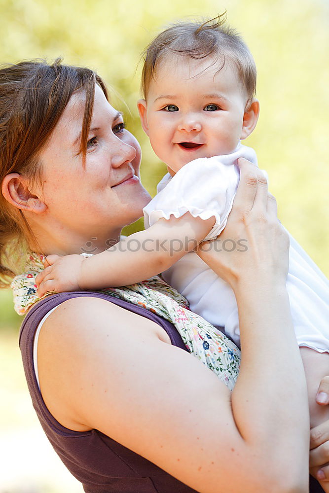 Similar – Image, Stock Photo Mother sitting with kid on hands