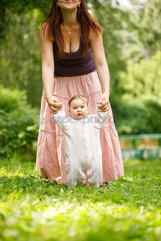 Similar – Mother playing with child in park