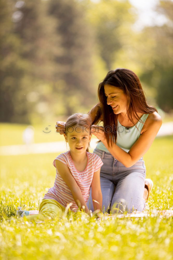 Similar – mother and little girl playing in the park