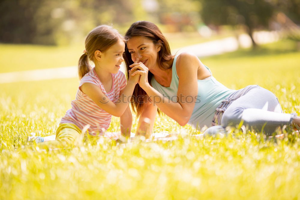 Similar – mother and little girl playing in the park