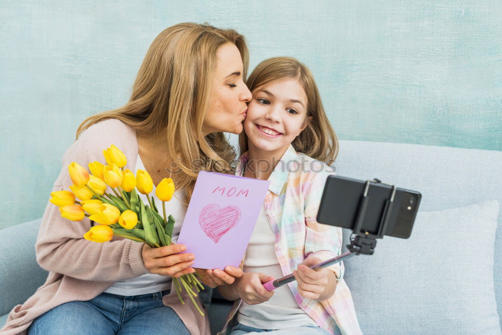 Similar – happy child boy giving flowers to mom