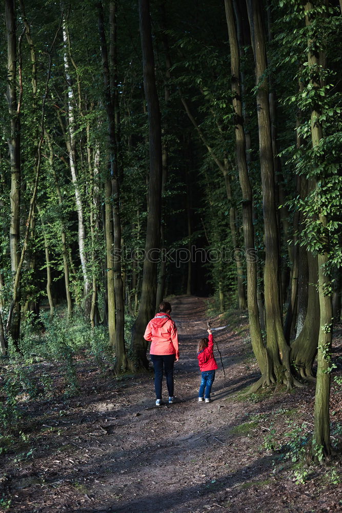 Image, Stock Photo Mother with her little daughter walking through the forest