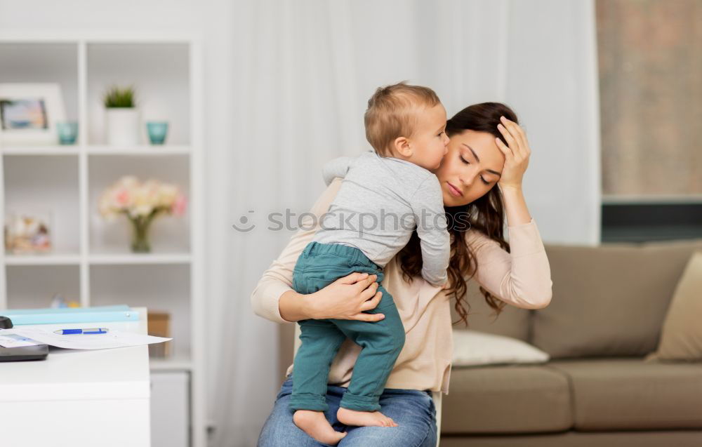 Similar – young happy mother comforting child son