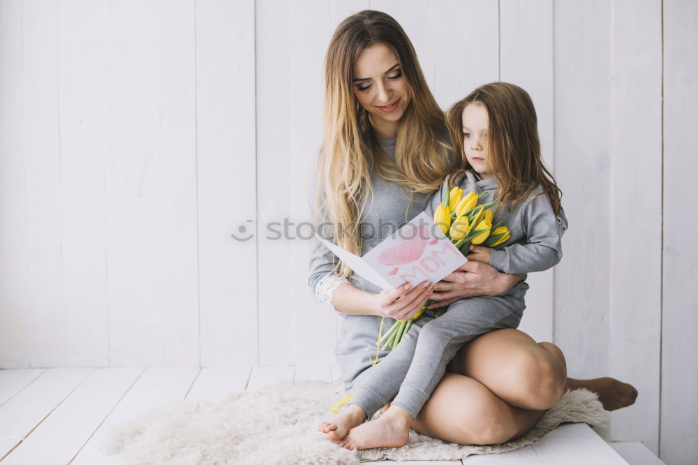 Similar – Image, Stock Photo African mother helping daughter doing homework