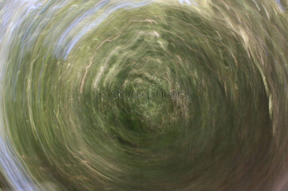 Image, Stock Photo Almost every road leads to the finish line / In a green field you can see two tire tracks. From left to top with a bend. The background is dark.