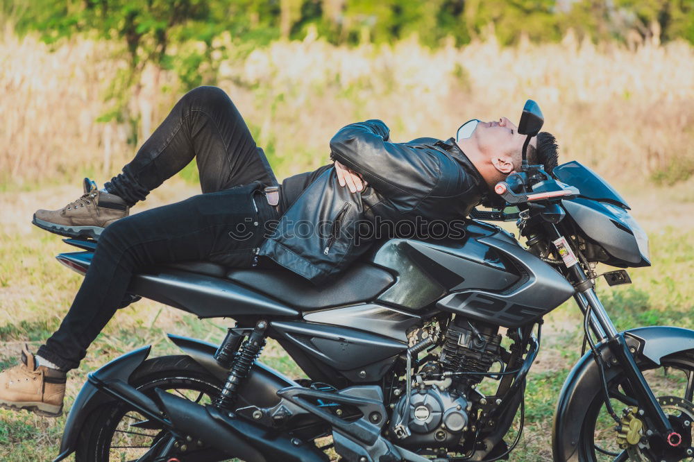 Similar – Woman with helmet riding custom motorbike