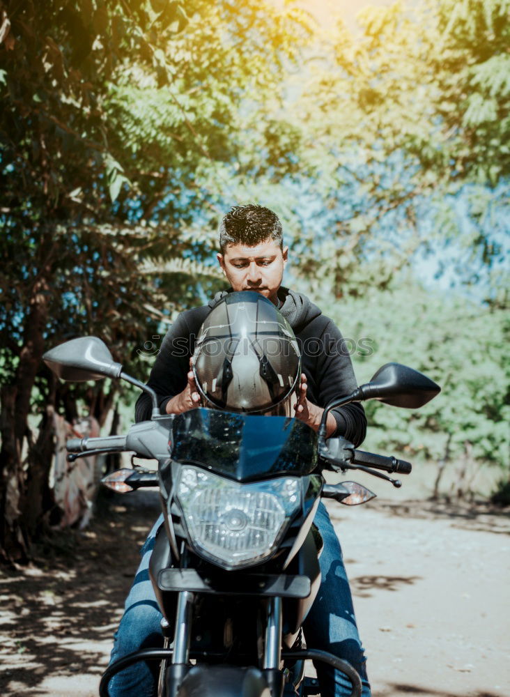 Similar – Woman with helmet riding custom motorbike