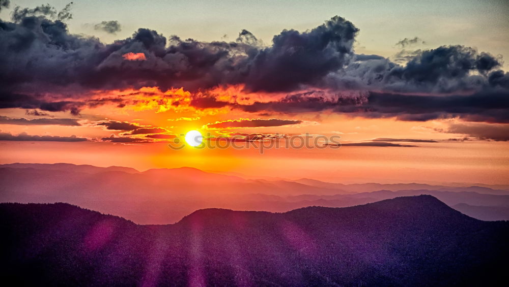 Similar – Panorama mountain landscape at sunset. Valley during sunrise.