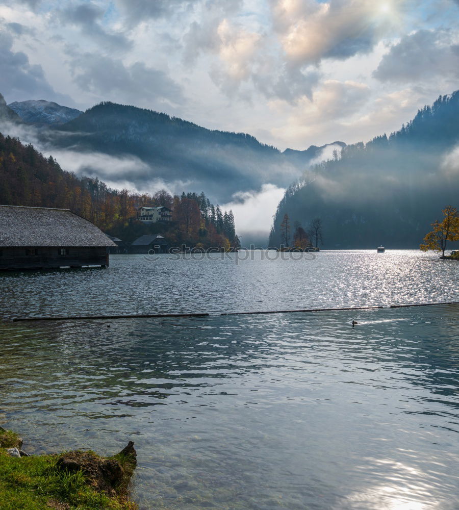 Similar – Sunny autumn day on the lake in mountains of south Austria