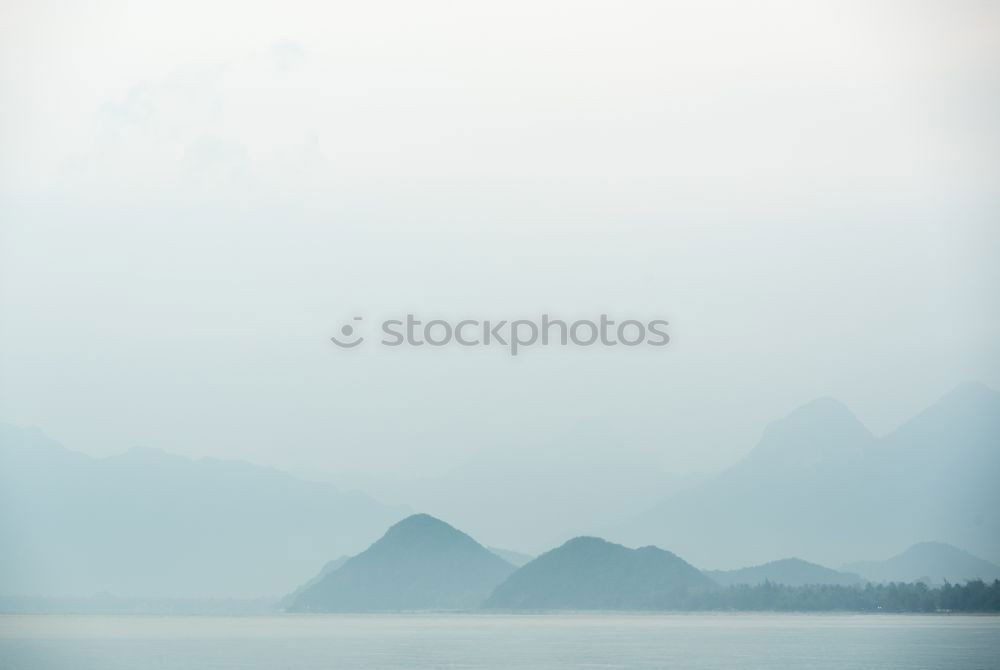 Similar – Flower meadow in front of mountain panorama