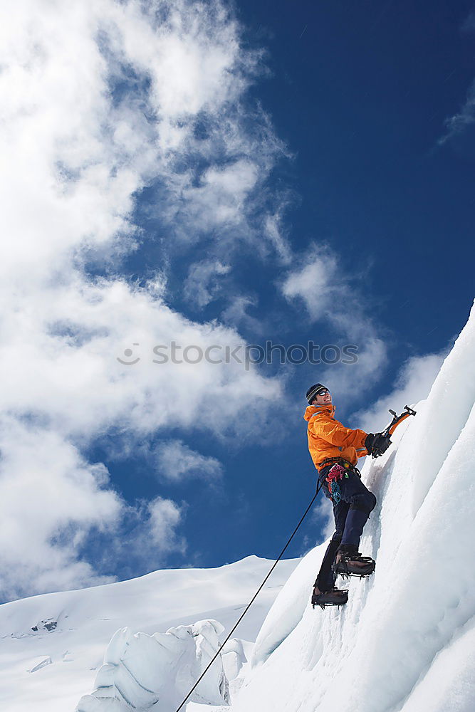 Similar – Image, Stock Photo Mountaineer climbs a snowy peak.