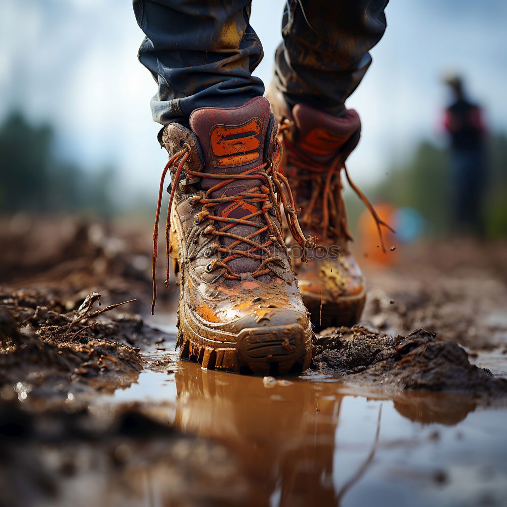 Image, Stock Photo Legs in leather boots in puddle