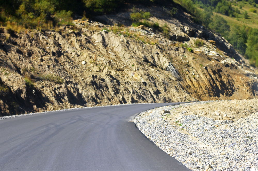 Similar – Desert road and mountains unreal