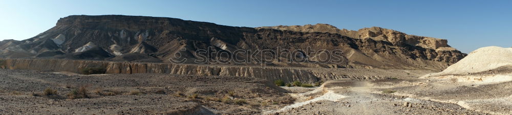 Similar – Image, Stock Photo Traveler on top of rocky mountain edge