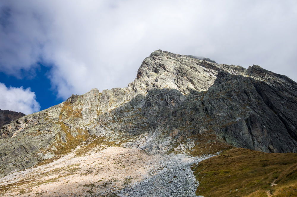 Similar – Swiss mountain peak Summer