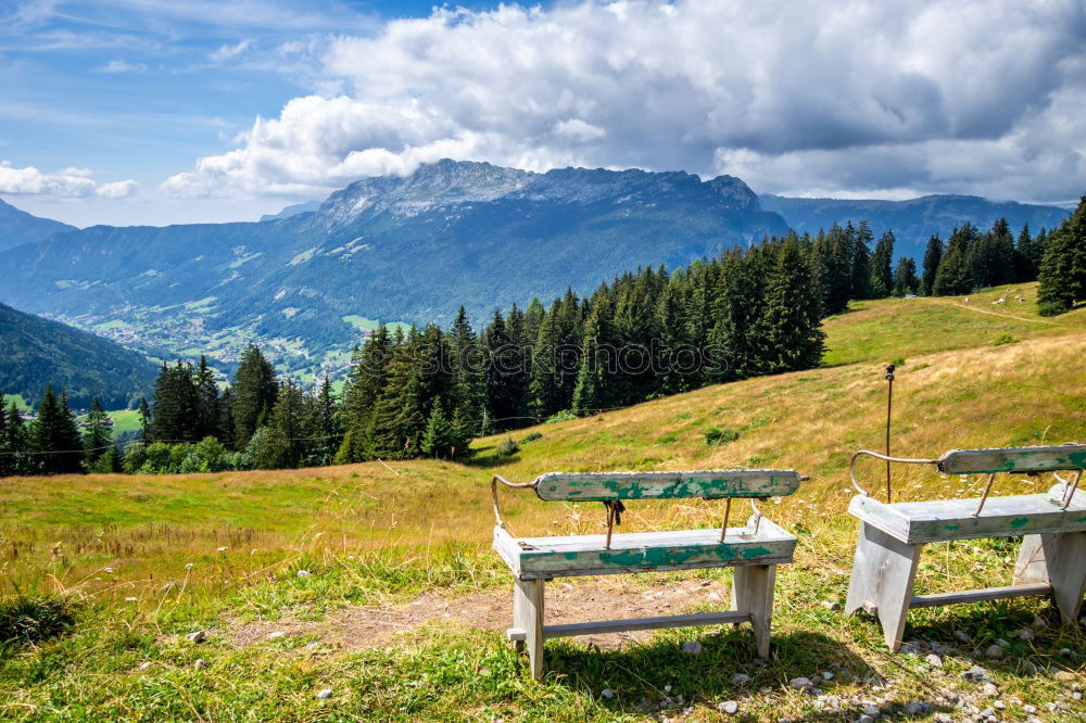 View of the Nockberge mountains from a bench