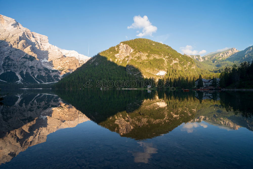 Similar – Mountain hut at Oeschinensee with intensive blue reflection