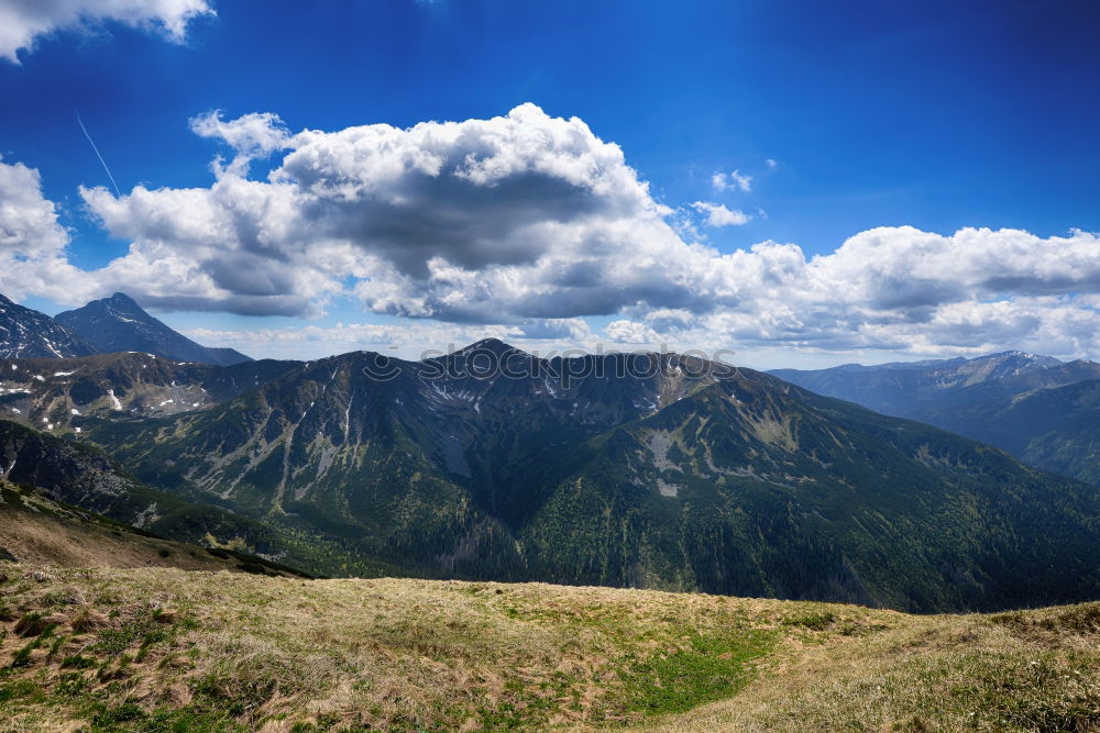 Similar – View of the Nockberge mountains from a bench