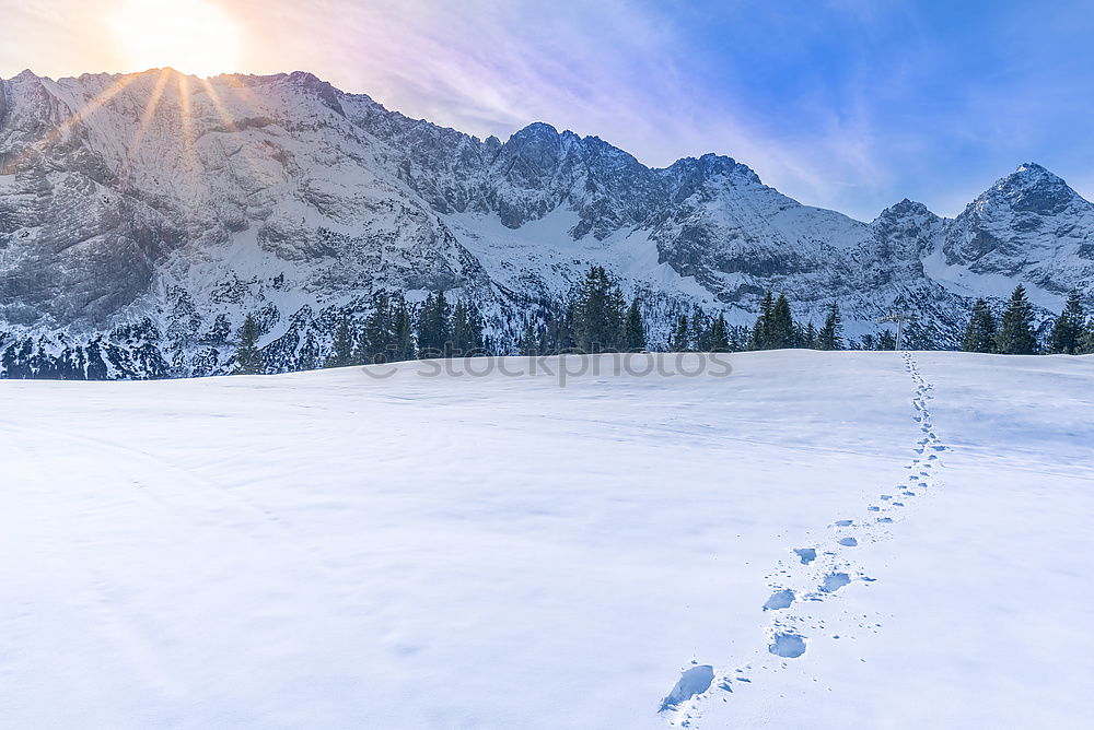 Similar – Image, Stock Photo Winter sunshine over snowy mountains