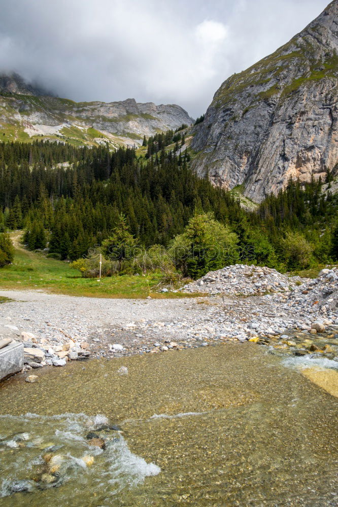 Similar – Image, Stock Photo Mountain river valley landscape