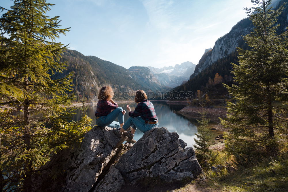 Similar – Image, Stock Photo Women sitting at lake