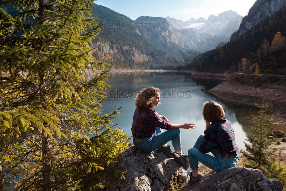 Image, Stock Photo Women sitting at lake