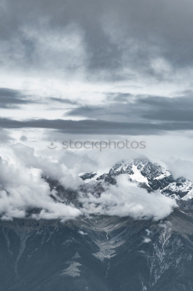 Similar – Image, Stock Photo Clouds and shadows in the Dolomites portrait