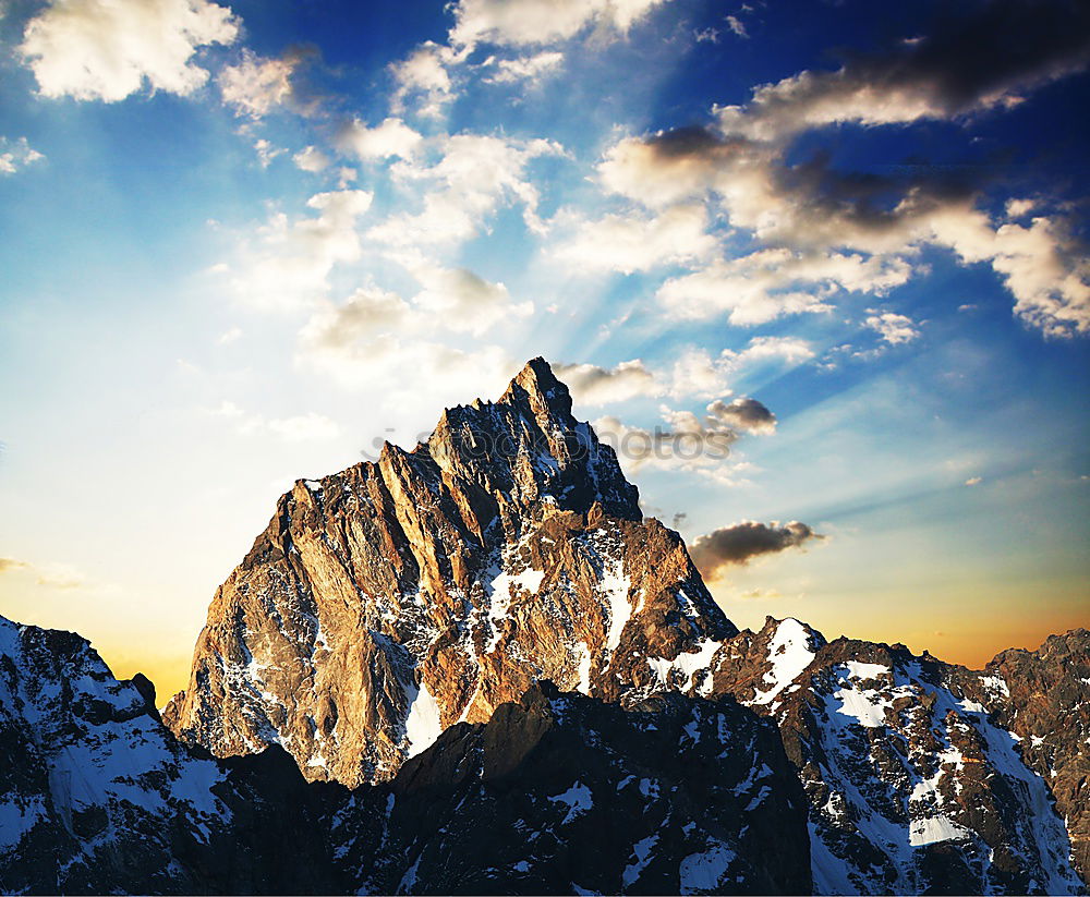 Similar – alpenglow, South Tyrol, snow, mountain peaks