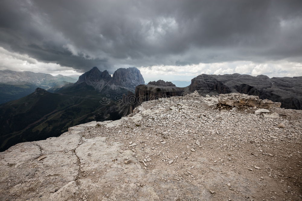 Similar – Storms in the Dolomites with rainbow